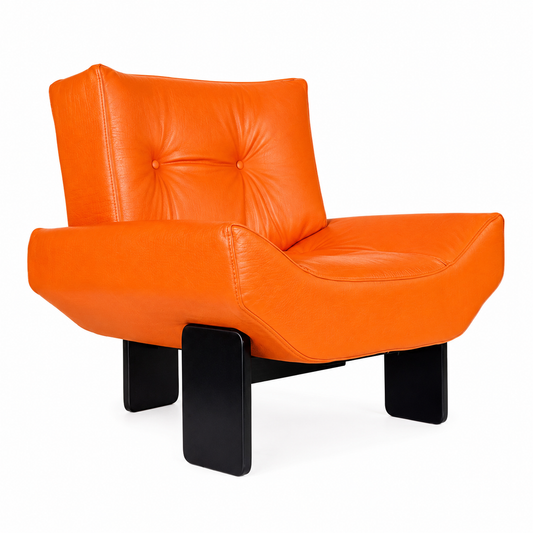 Ambra orange lounge chair, three-quarter view showing the back profile