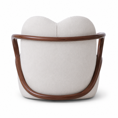 Sienna sculptural lounge chair, angled view showing the curved wood-look frame
