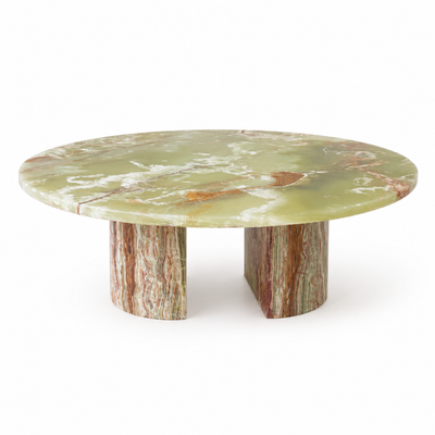 Verde coffee table with a large circular green stone-look top on three sculptural slab legs