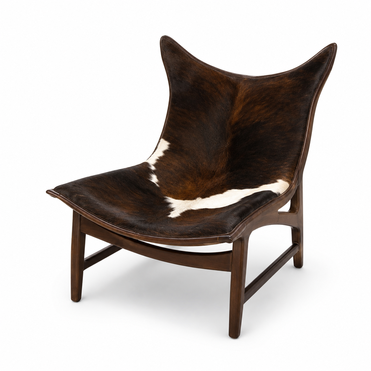 Savana sling lounge chair with a brown and white cowhide seat on a solid walnut frame
