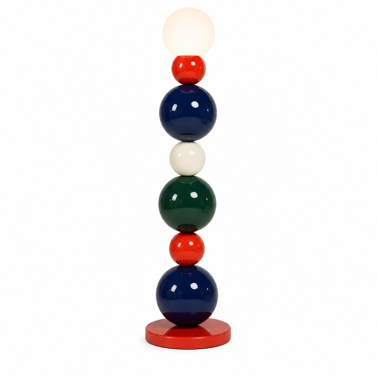Perla floor lamp with stacked red, navy, cream and green lacquered spheres on a red disc base