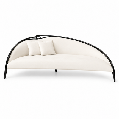 Mezzaluna Crescent Sofa in cream bouclé with a black lacquer arc frame and two scatter cushions