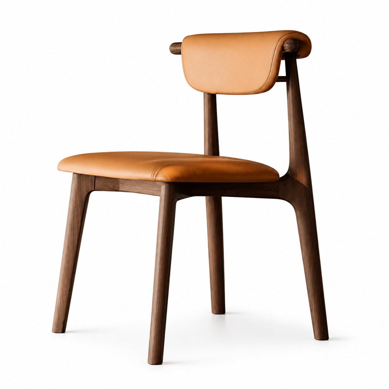 Tobia Rolled-Back Dining Chair in tan leather on an oiled walnut frame, three-quarter view