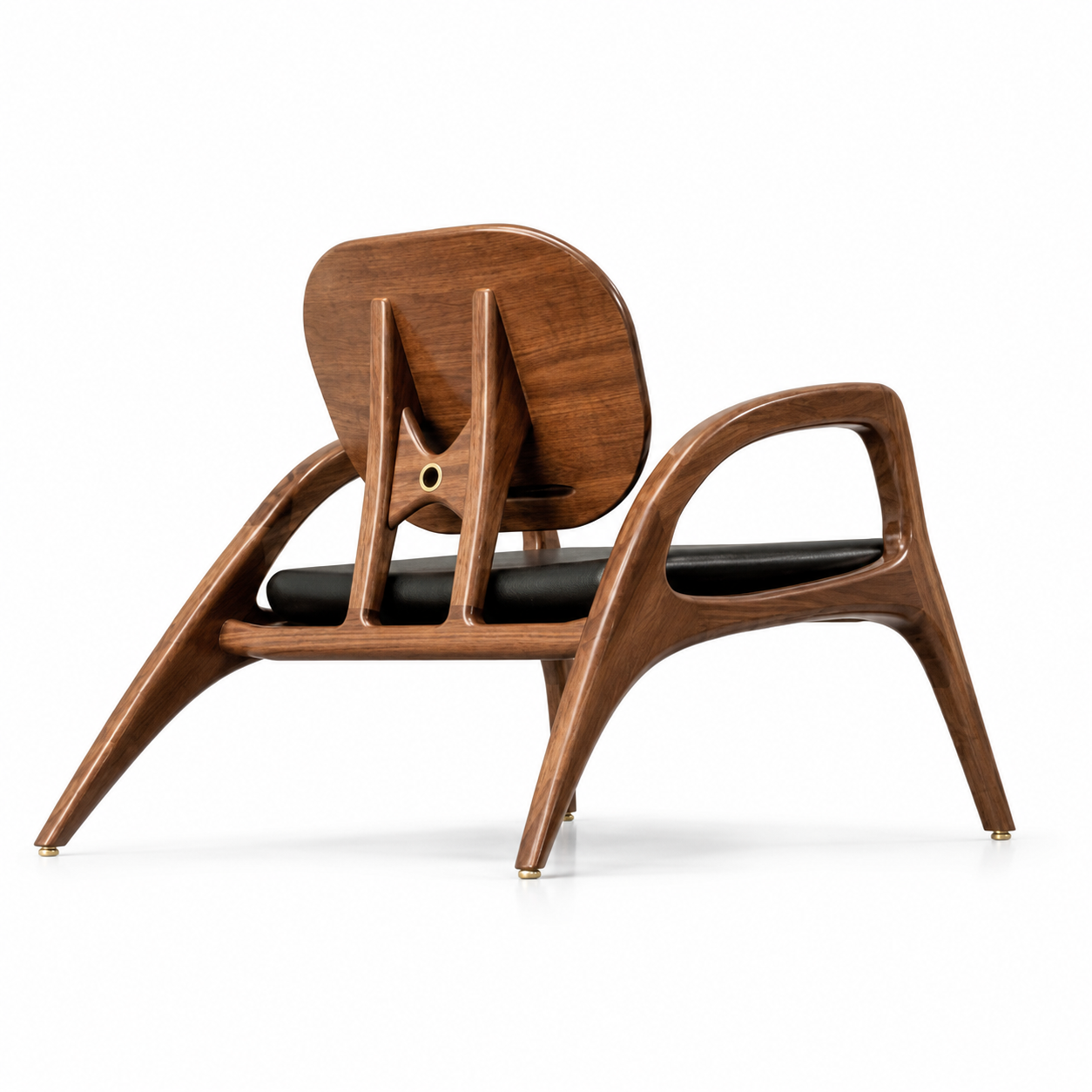 Notte lounge chair, rear view showing the wood-look shell